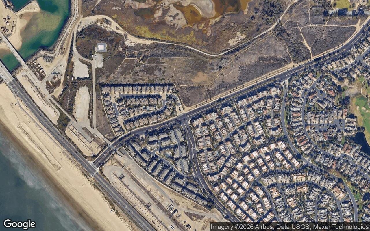 Satellite aerial view of Seacliff in Huntington Beach, California, showing the neighborhood's streets and surroundings.